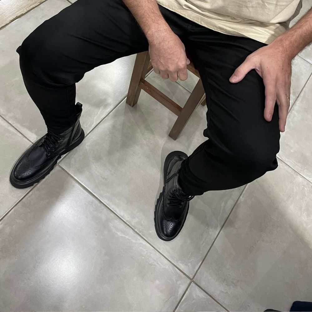 Black Donatello Leather Wingtip Boots